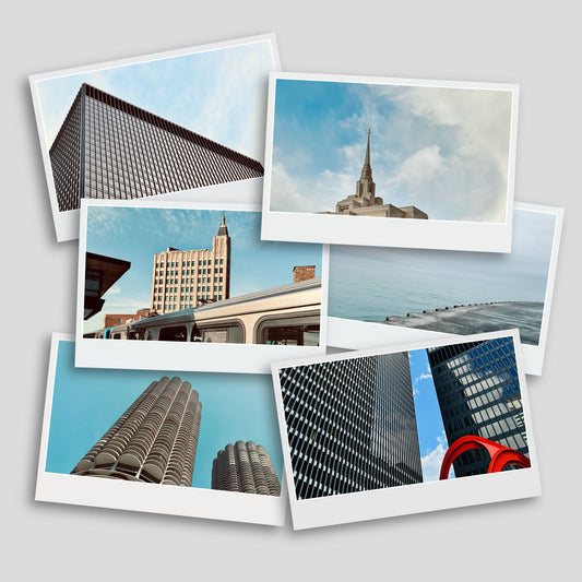 Collection of six postcards with cityscape images on a light gray background